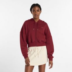 Bluza damska New Balance WJ51506MHB – bordowa. Czerwone bluzy New Balance, s, bez wzorów, z bawełny, z kapturem. Za 399.99 zł.