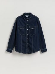 Jeansowa koszula oversize - granatowy. Niebieskie koszule Reserved, l, bez wzorów, z denimu, bez kołnierzyka, bez ramiączek. Za 139.99 zł.
