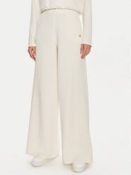 Guess Spodnie dresowe Olympe V4YB07 KCAY2 Beżowy Relaxed Fit. Brązowe spodnie sportowe Guess, m, z aplikacjami, z dresówki. Za 269.99 zł.