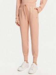Lacoste Spodnie dresowe XF0343 Pomarańczowy Regular Fit. Brązowe spodnie dresowe Lacoste, bez wzorów, z bawełny. Za 439.99 zł.