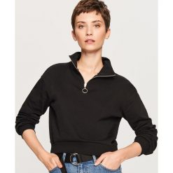 Krótka bluza ze stójką - Czarny. Czarne bluzy sportowe marki Reserved, l. W wyprzedaży za 34.99 zł.