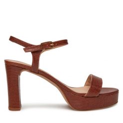Sandały Unisa. Brązowe sandały Unisa, bez wzorów, bez obcasa, na słupku, bez zapięcia. Za 479.99 zł.