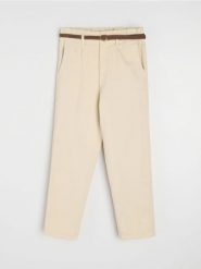 Jeansy mom paperbag z wysokim stanem - kremowy. Białe jeansy Sinsay, bez wzorów, z podwyższonym stanem. Za 69.99 zł.