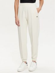 Guess Spodnie dresowe V5RB11 KCAY2 Écru Regular Fit. Spodnie dresowe Guess, l, z aplikacjami, z dresówki. Za 269.99 zł.