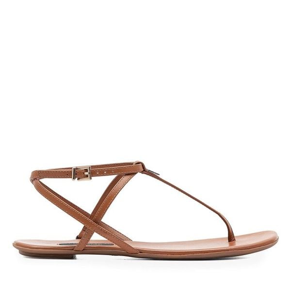 Sandały GINO ROSSI. Brązowe sandały Gino Rossi, bez wzorów, bez obcasa, na płaskiej podeszwie, bez zapięcia. Za 249.99 zł.