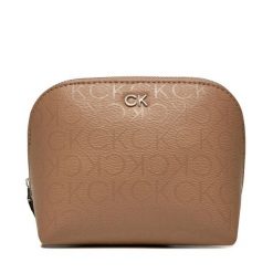 Kosmetyczka Calvin Klein. Brązowe kufry i kosmetyczki Calvin Klein, bez wzorów, bez dodatków. Za 189.99 zł.