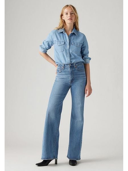Levi's Dżinsy - Comfort fit - w kolorze niebieskim rozmiar: W25/L34. Niebieskie jeansy Levi's®, l, z aplikacjami, z podwyższonym stanem. Za 268.55 zł.