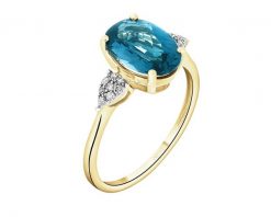 Pierścionek z żółtego złota z diamentami i topazem London Blue - próba 585. Niebieskie pierścionki Apart, z diamentem, złote. Za 2,990.00 zł.