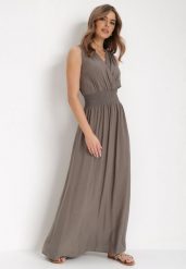Ciemnozielona Sukienka Clymiolea. Zielone sukienki Born2be, s, bez wzorów, z tkaniny, eleganckie, bez kołnierzyka, bez ramiączek, maxi, kopertowe. Za 59.99 zł.