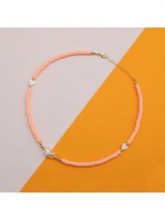 Heliophilia Naszyjnik z elementami ozdobnymi - dł. 42 cm rozmiar: onesize. Żółte naszyjniki Heliophilia, z perłą, metalowe. Za 34.99 zł.