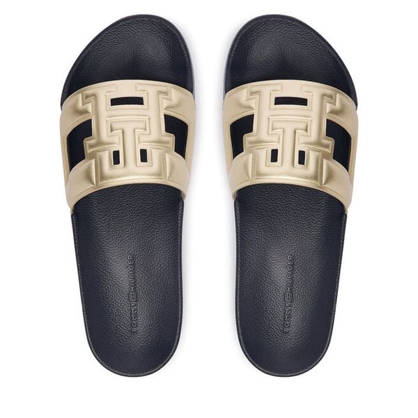Klapki Tommy Hilfiger. Żółte klapki TOMMY HILFIGER, bez wzorów, bez obcasa. Za 189.99 zł.