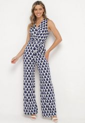 Granatowo-Biały Taliowany Kombinezon z Kopertowym Dekoltem i Materiałowym Paskiem w Talii Feranea. Niebieskie sukienki Born2be, na co dzień, na lato, l, bez wzorów, z jeansu, eleganckie, bez kołnierzyka, bez ramiączek, kopertowe. Za 139.99 zł.