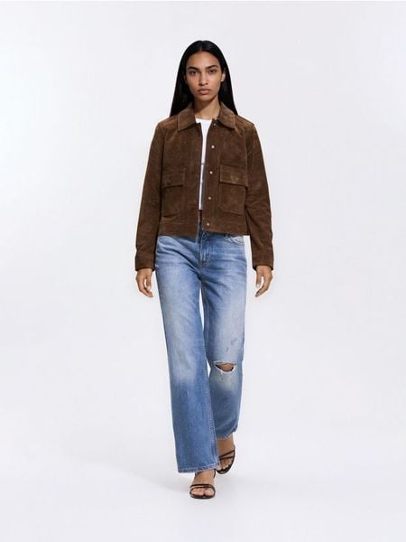 Jeansy straight fit z przetarciami - niebieski. Niebieskie jeansy Reserved, bez wzorów. Za 149.99 zł.