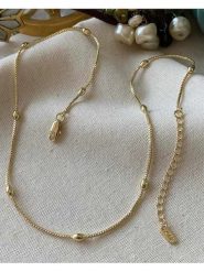 Luseera Pozłacany naszyjnik z elementami ozdobnymi - dł. 45 cm rozmiar: onesize. Żółte naszyjniki Luseera, pozłacane. Za 43.99 zł.