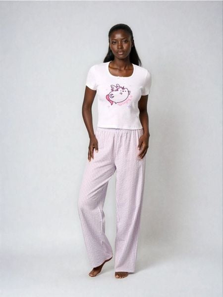 Piżama dwuczęściowa z nadrukiem Pusheen The Cat - biały. Białe piżamy Sinsay, bez wzorów, bez ramiączek. Za 69.99 zł.