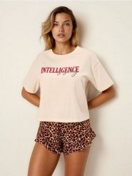 Bawełniana piżama dwuczęściowa z motywem panterki - kremowy. Białe piżamy Sinsay, bez wzorów, z bawełny, bez ramiączek. Za 39.99 zł.