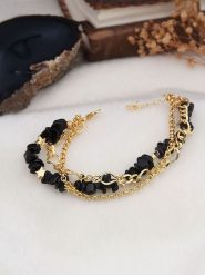 L'Atelier de Gaia Pozłacana bransoletka z elementami ozdobnymi rozmiar: onesize. Czarne bransoletki L'Atelier de Gaia, z onyksem, pozłacane. Za 34.99 zł.