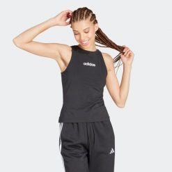 Koszulka bez rękawów damska ADIDAS Gym & Pilates. Koszulki sportowe Adidas, bez wzorów, z bawełny, bez ramiączek, na fitness i siłownię. Za 89.99 zł.