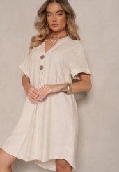 Jasnobeżowa Sukienka z Bawełny o Pudełkowym Kroju z Dużymi Guzikami Elanorella. Brązowe sukienki Renee, na co dzień, na lato, m, bez wzorów, z bawełny, eleganckie, bez kołnierzyka, bez ramiączek, kopertowe. Za 74.99 zł.