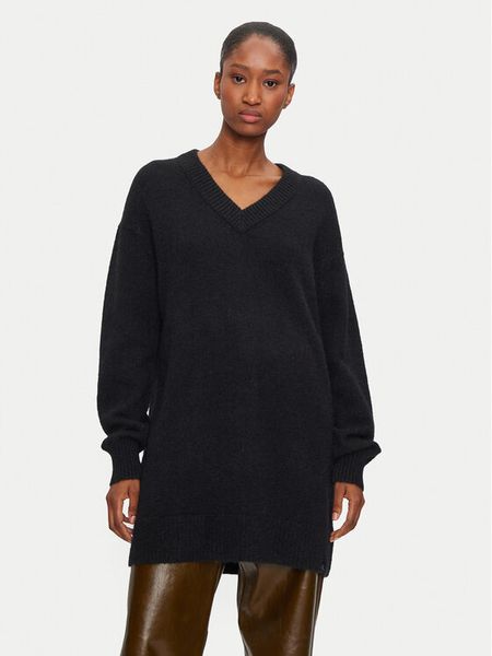 Calvin Klein Jeans Sukienka dzianinowa J20J224638 Czarny Loose Fit. Czarne sukienki Calvin Klein Jeans, m, bez wzorów, z dzianiny, bez kołnierzyka, bez ramiączek. Za 349.99 zł.