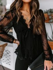 Milan Kiss Bluzka w kolorze czarnym rozmiar: S. Czarne bluzki Milan Kiss, s, bez wzorów, z koronki, bez kołnierzyka, bez ramiączek. Za 195.77 zł.