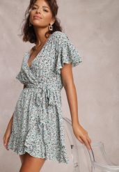 Niebieska Sukienka Myrithelphise. Niebieskie sukienki Renee, m, bez wzorów, z materiału, bez kołnierzyka, bez ramiączek, mini, kopertowe. Za 49.99 zł.