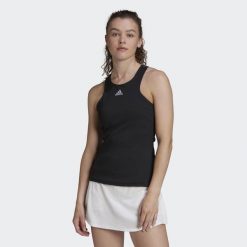 Damski tank top adidas Tennis Y. Czarne koszulki sportowe Adidas, bez wzorów, z materiału, bez ramiączek, tenisowe. W wyprzedaży za 186.20 zł.