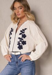 Różowa Bluzka z Wiskozy Ozdobiona Falbankami i Wiązaniem Fonoriel. Czerwone bluzki Renee, l, bez wzorów, z jeansu, eleganckie, bez kołnierzyka, bez ramiączek. W wyprzedaży za 69.99 zł.