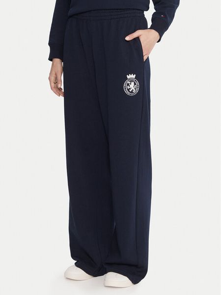 Tommy Hilfiger Spodnie dresowe UW0UW06081 Granatowy Wide Leg. Niebieskie spodnie dresowe TOMMY HILFIGER, s, bez wzorów, z bawełny. Za 279.99 zł.