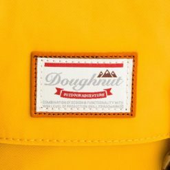 Plecak Doughnut. Żółte plecaki Doughnut, bez wzorów. Za 239.99 zł.