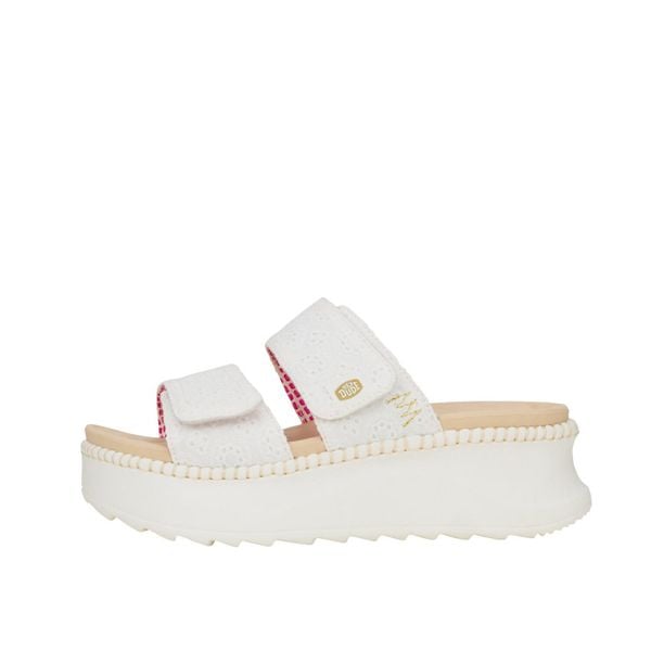 Sandały HEY DUDE DELRAY SLIDE EYELET Biały. Białe sandały PRO BRANDS, bez wzorów, z tkaniny, bez obcasa, bez zapięcia. Za 339.37 zł.