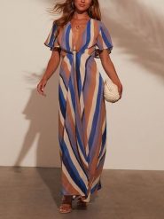 Milan Kiss Sukienka w kolorze jasnobrązowo-niebiesko-beżowym rozmiar: S. Brązowe sukienki Milan Kiss, s, bez wzorów, z wiskozy, bez kołnierzyka, bez ramiączek, maxi. Za 173.99 zł.