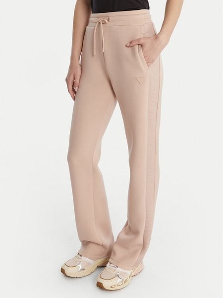 Guess Spodnie dresowe V3RB21 K7UW2 Beżowy Regular Fit. Brązowe spodnie dresowe Guess, xs, z aplikacjami, z dresówki. Za 399.99 zł.