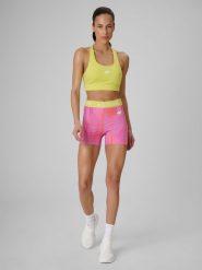 4F Legginsy krótkie treningowe damskie - koralowe L. Pomarańczowe legginsy 4f, l, bez wzorów, z materiału, z podwyższonym stanem, krótkie. Za 99.99 zł.