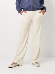 Toni Spodnie w kolorze kremowym rozmiar: W42. Brązowe spodnie materiałowe Toni, bez wzorów, z materiału. Za 152.99 zł.