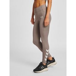 Damskie legginsy mid-rise Hummel MT Chipo. Szare legginsy sportowe Hummel, na jesień, xs, bez wzorów, z elastanu, na fitness i siłownię. Za 189.40 zł.