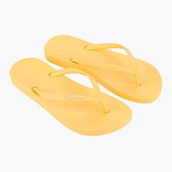 Japonki damskie Ipanema Anat Colors. Żółte klapki Ipanema, bez wzorów, z materiału, bez obcasa. Za 52.99 zł.