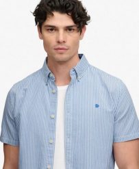 Superdry Koszula Preppy Oxford krótki rękaw – 100% Bawełna organiczna, luźny. Niebieskie koszule Superdry, xl, bez wzorów, z bawełny, klasyczne, bez kołnierzyka, bez ramiączek. Za 282.85 zł.