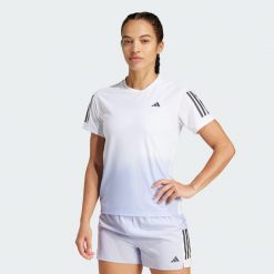 Koszulka Own the Run CLIMACOOL Colorblock. Białe bluzki Adidas, s, bez wzorów, sportowe, bez kołnierzyka, bez ramiączek. W wyprzedaży za 139.05 zł.