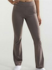 Sportowe legginsy flare - kremowy. Białe legginsy Sinsay, l, bez wzorów. Za 49.99 zł.