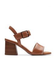 Clarks Skórzane sandały "Siara65 Buckle" w kolorze jasnobrązowym na obcasie rozmiar: 39,5. Brązowe sandały Clarks, bez wzorów, z otwartym noskiem, bez obcasa, na koturnie, bez zapięcia. Za 198.10 zł.