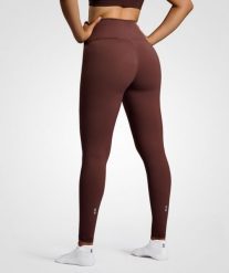 Legginsy do tenisa/padel damskie Smart z kieszenią na piłki. Brązowe legginsy NORDICDOTS, bez wzorów, z materiału. Za 365.00 zł.
