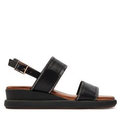 Sandały Inuovo. Czarne sandały Inuovo, bez wzorów, bez obcasa, na koturnie, bez zapięcia. Za 459.99 zł.