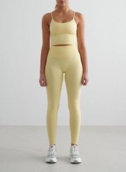 Damskie legginsy bezszwowe, wysoki stan, squat proof petite Shape żółty mellow. Żółte legginsy AIM'N, m, bez wzorów, z elastanu, z podwyższonym stanem. Za 297.00 zł.