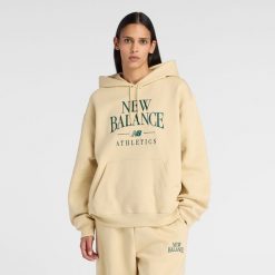 Bluza damska New Balance WT61U6QSABC - żółta. Żółte bluzy New Balance, xl, bez wzorów, z bawełny, bez kaptura. Za 299.99 zł.