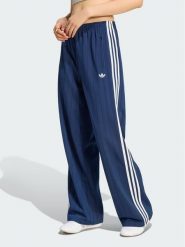 Adidas Spodnie dresowe 165468 Niebieski jasny Loose Fit. Niebieskie spodnie dresowe Adidas, s, bez wzorów, z dresówki. Za 299.99 zł.