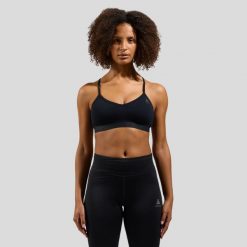 Biustonosz sportowy damski ODLO Merino Soft Sport Bra. Czarne koszulki sportowe Odlo, bez wzorów, bez ramiączek, na jogę i pilates. Za 249.99 zł.