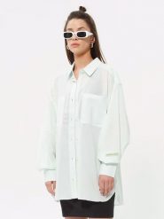 Reebok Koszula w kolorze miętowym rozmiar: S. Zielone koszule Reebok, s, bez wzorów, bez kołnierzyka, bez ramiączek. Za 66.00 zł.