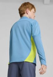 Młodzieżowa bluza treningowa Manchester City F.C. z zamkiem 1/4 PUMA. Niebieskia bluzy Puma, m, bez wzorów, bez kaptura. Za 304.50 zł.