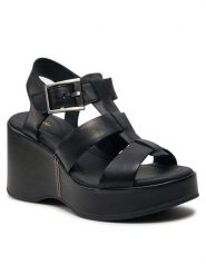 Clarks Sandały Manon Cove 26176294 Czarny. Czarne sandały Clarks, bez wzorów, ze skóry, bez obcasa, na koturnie, bez zapięcia. Za 309.99 zł.